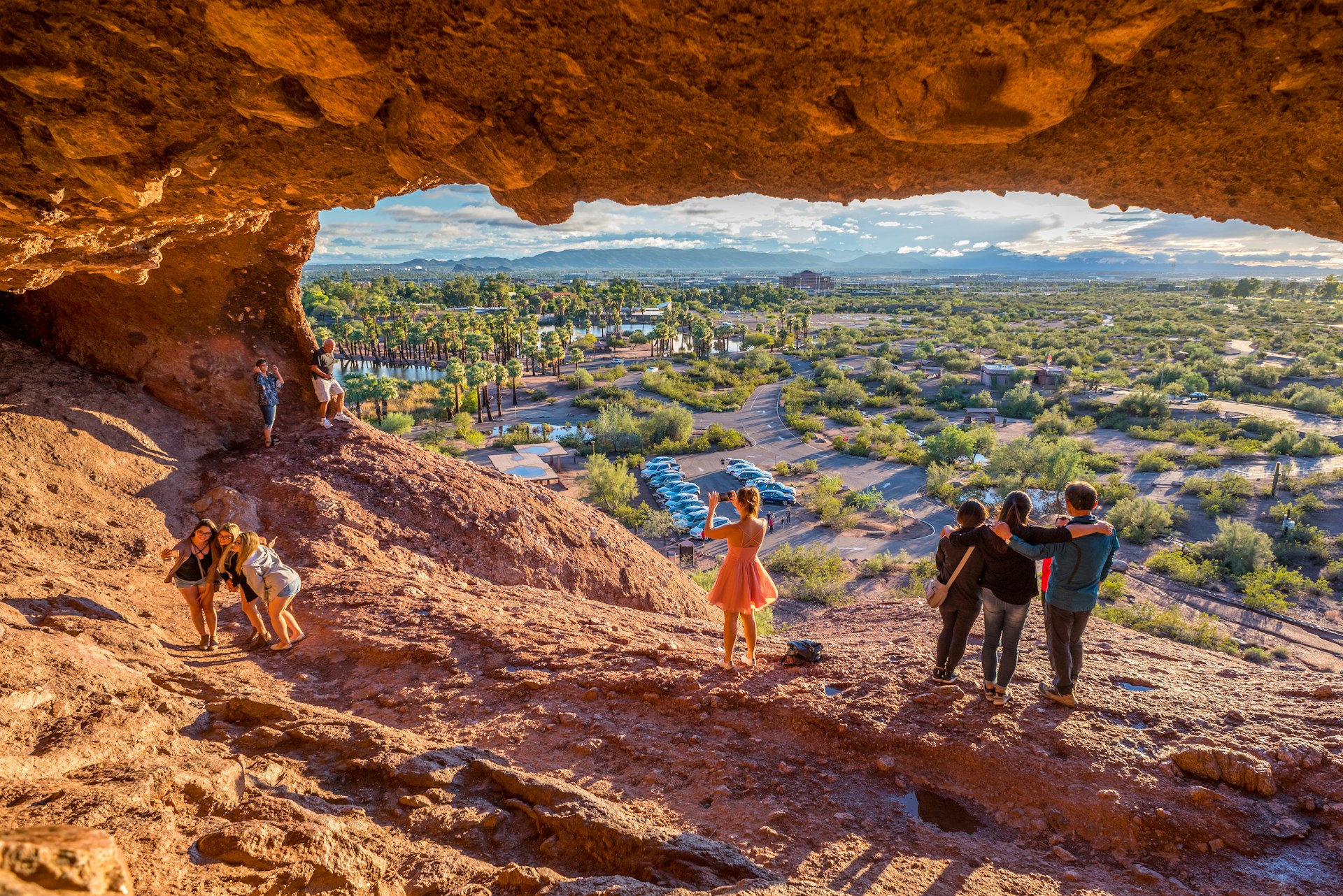 People snap selfies in the mouth of Hole-in-the-Rock, Phoenix, Arizona