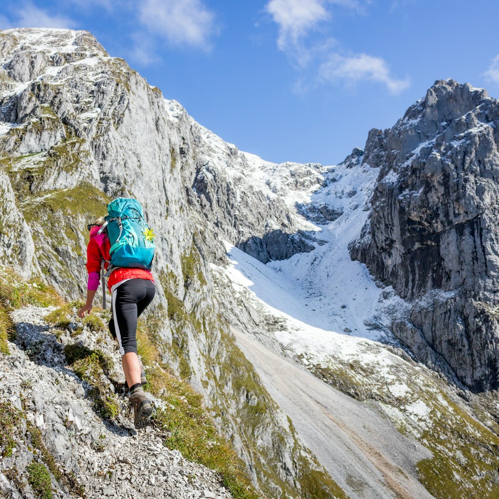 Female hiker on a snowcapped mountain in Austria