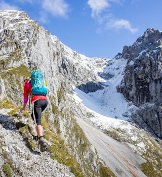 Female hiker on a snowcapped mountain in Austria