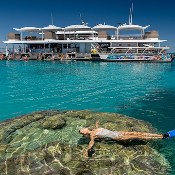 Lady Musgrave Island, Kate Bray from Bundaberg enjoying the Lady Musgrave HQ pontoon, where you can sleep on the reef