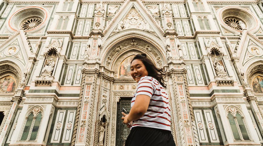 Asiatisk turist på besök i Florens, Italien