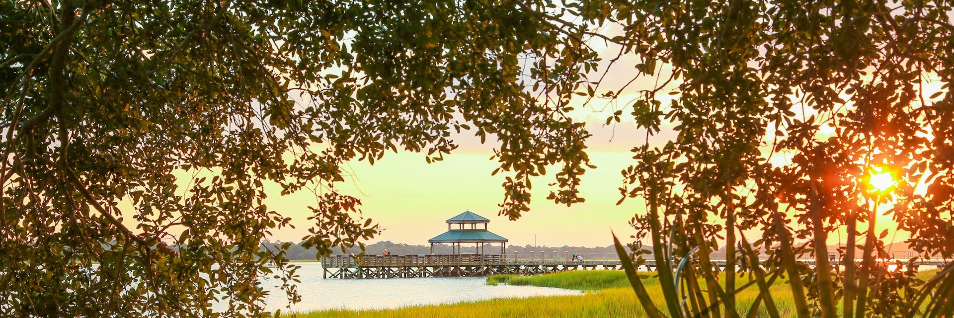 The little fishing pier by the Ashley River at Brittlebank Park in Charleston, SC.