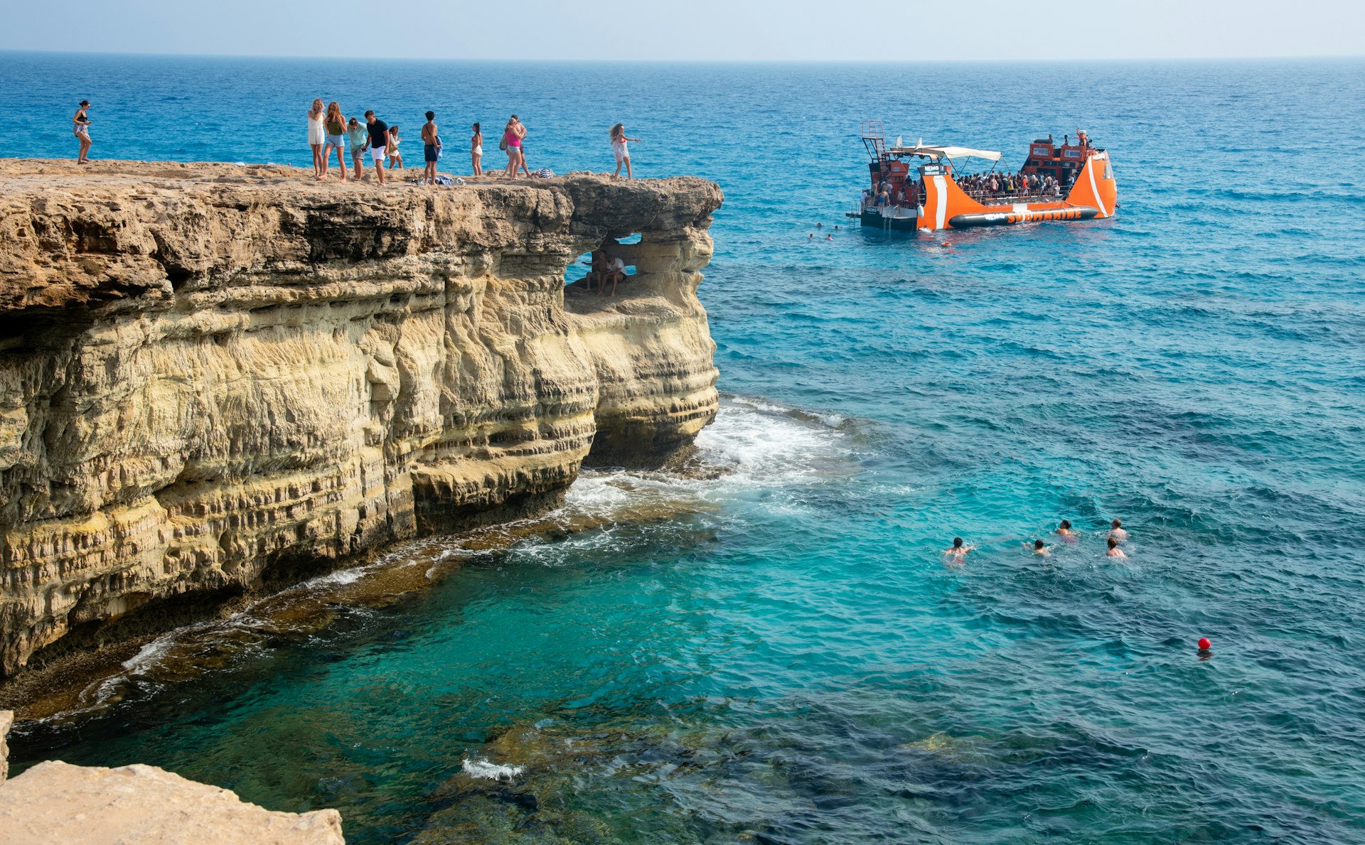 People swimming at Cape Greco in Cyprus