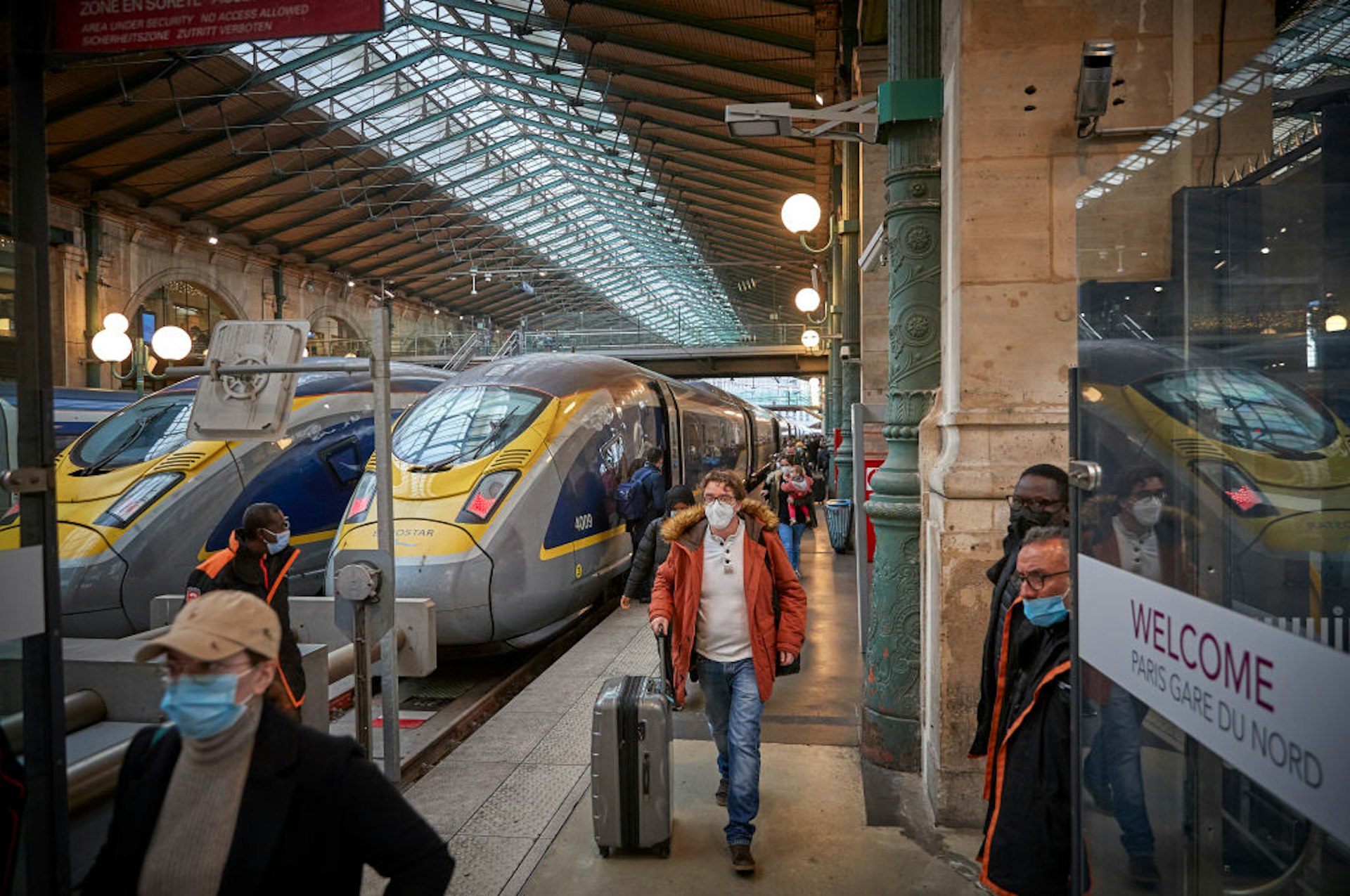 Passengers arrive from London at the Eurostar terminal at Paris Gare du Nord station