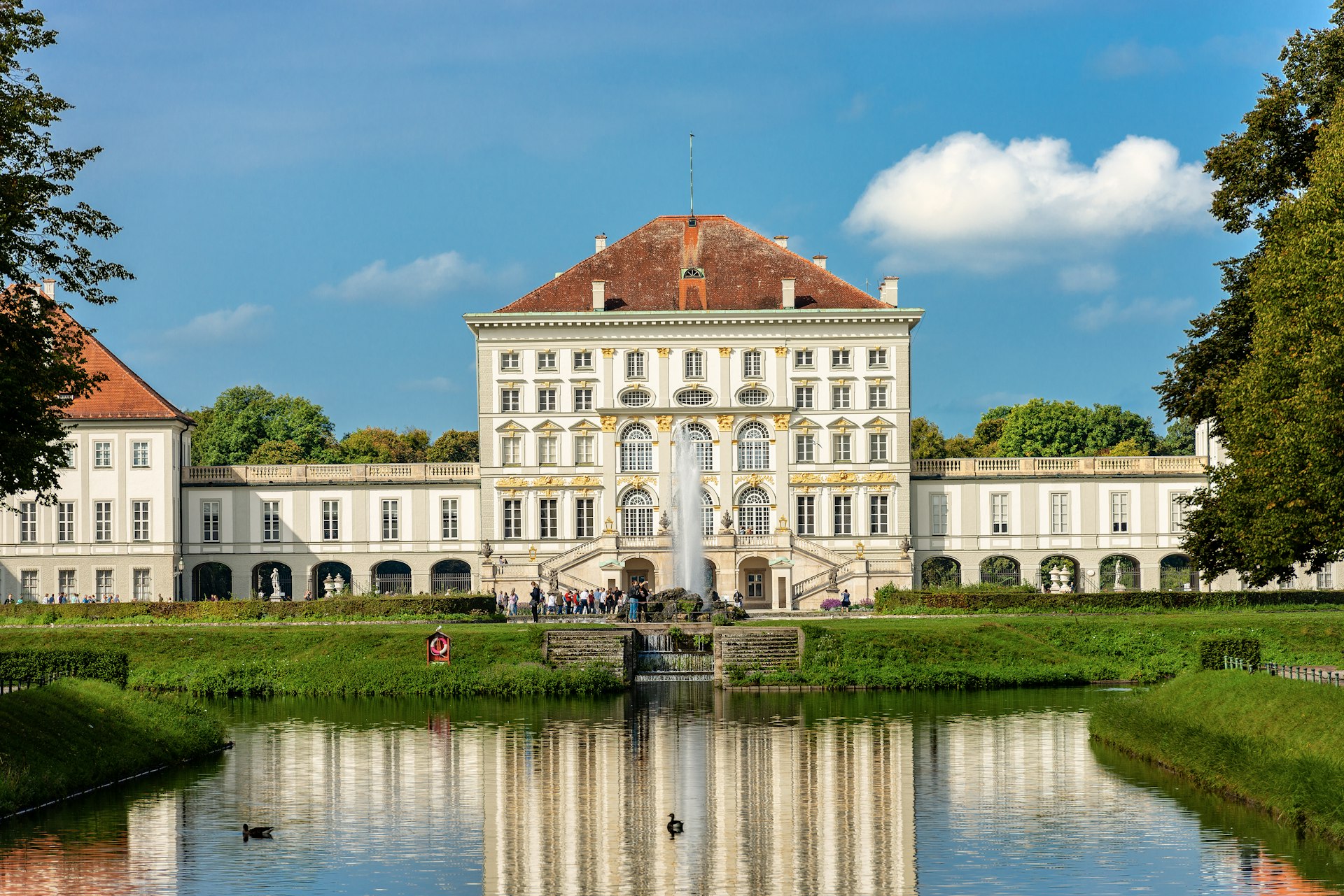 The grounds of Schloss Nymphenburg reflected in the river
