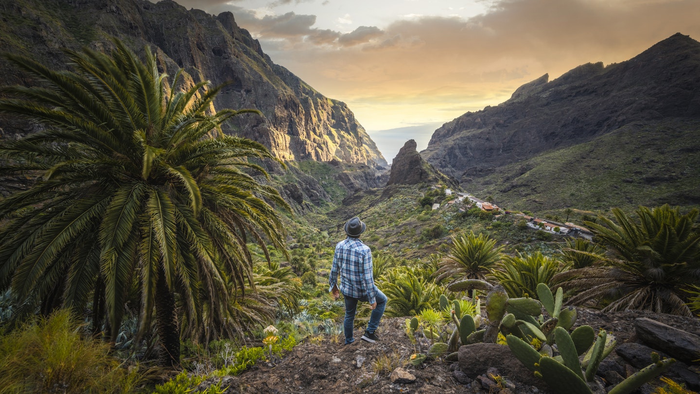 Tourist admiring the view in Masca, Tenerife, Spain