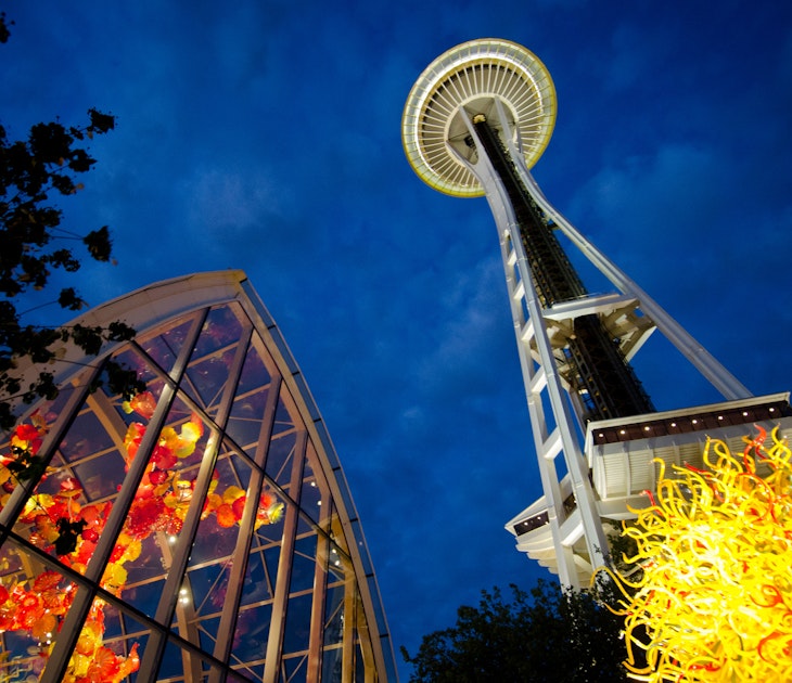 Chihuly Sculptures and Seattle's Space Needle

Seattle, WA, USA - June 2, 2014: The Chihuly Garden and Glass exhibit illuminate the night as the world famous Space Needle towers above. The exhibit in the Seattle Center showcases the artwork of Dale Chihuly and opened in 2012.