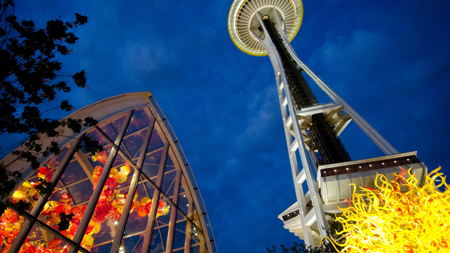 Chihuly Sculptures and Seattle's Space Needle
Seattle, WA, USA - June 2, 2014: The Chihuly Garden and Glass exhibit illuminate the night as the world famous Space Needle towers above. The exhibit in the Seattle Center showcases the artwork of Dale Chihuly and opened in 2012.