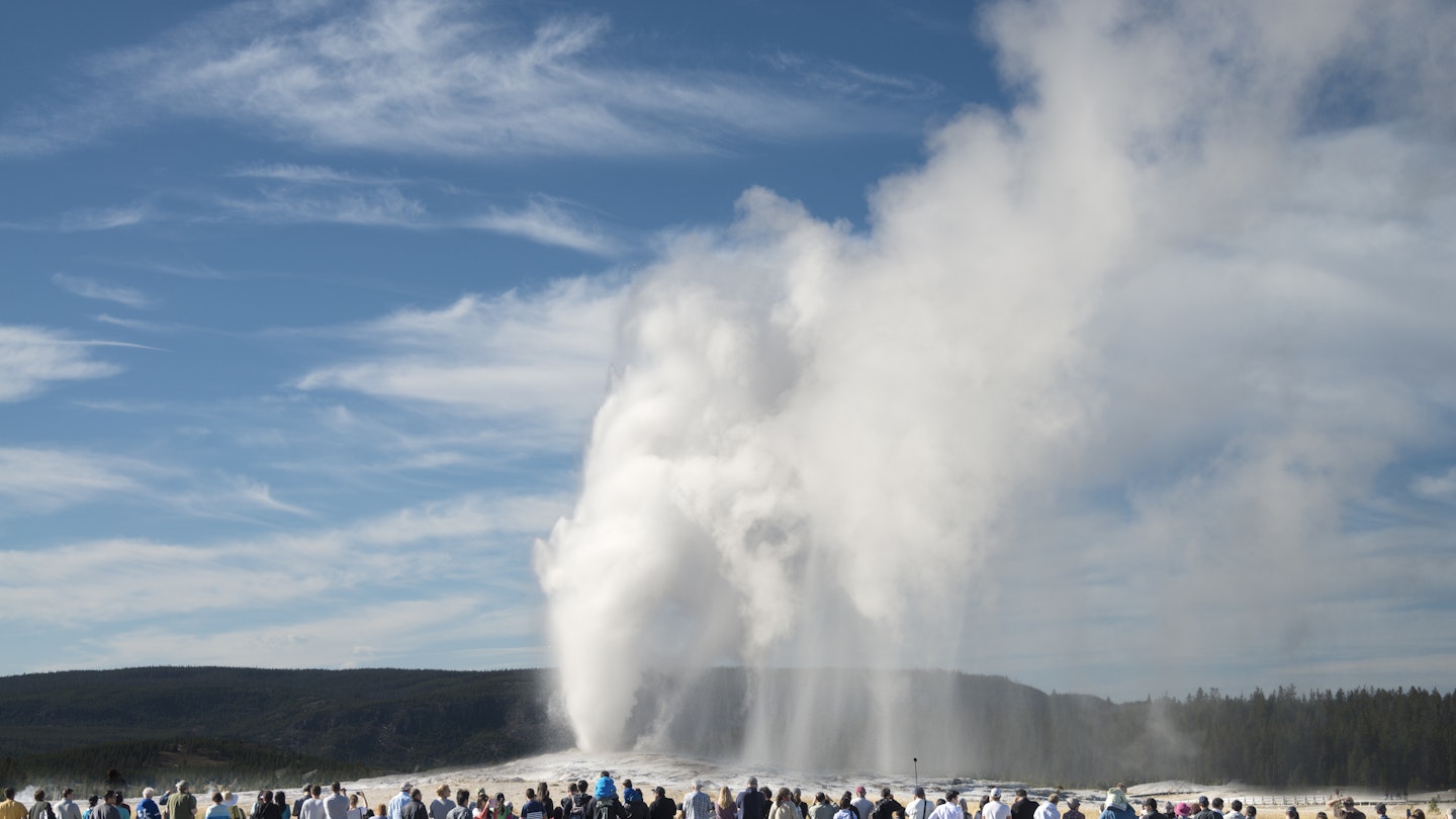 Crowd viewing the iconic Old Faithful geyser in Yellowstone National Park
