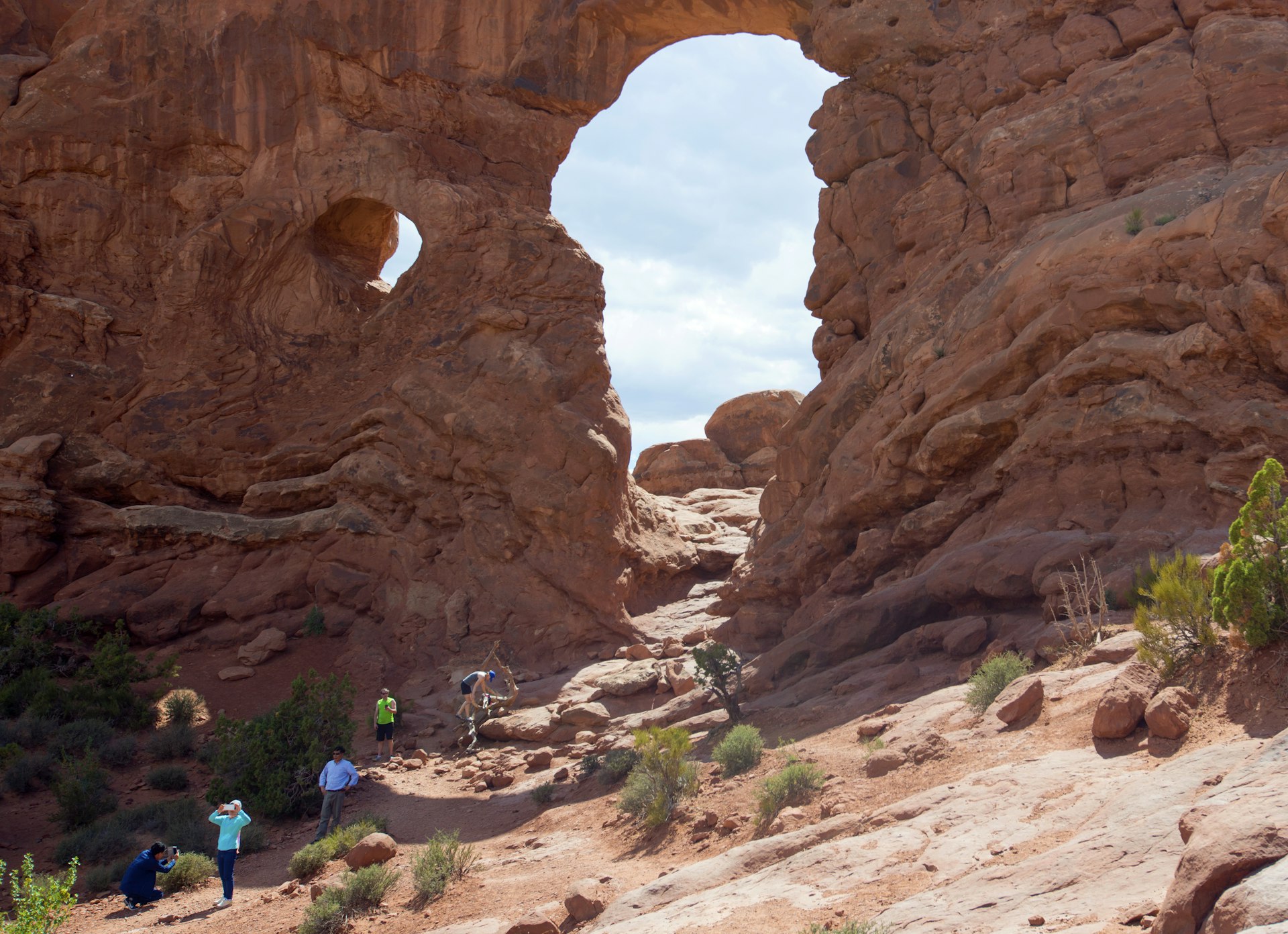 Hikers/Tourist at Arches National Park, Turret Arch, Utah.