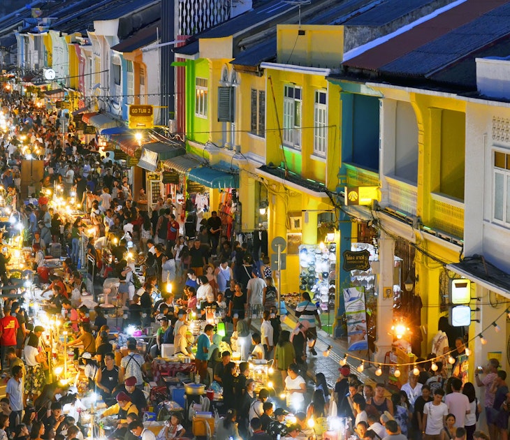 Each Sunday in the end of the afternoon a huge street food market takes place in the whole Thalang Road - thanon Thalang in Thai - in Phuket Old Townn Thailand, till late in the night.