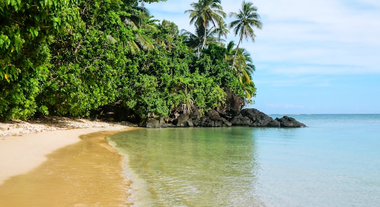 Sandy beach along Lavena Coastal Walk on Taveuni Island, Fiji.