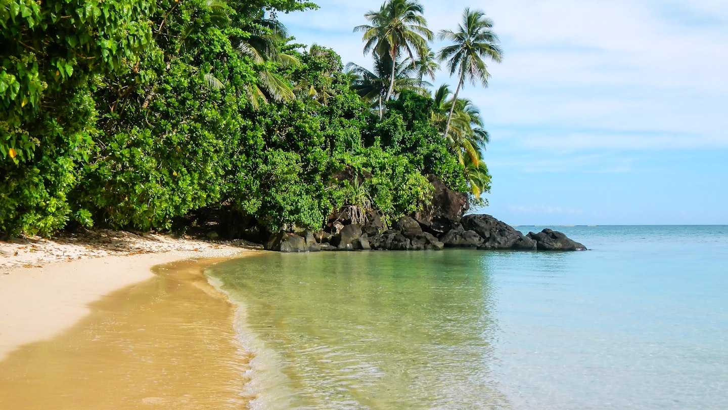 Sandy beach along Lavena Coastal Walk on Taveuni Island, Fiji.