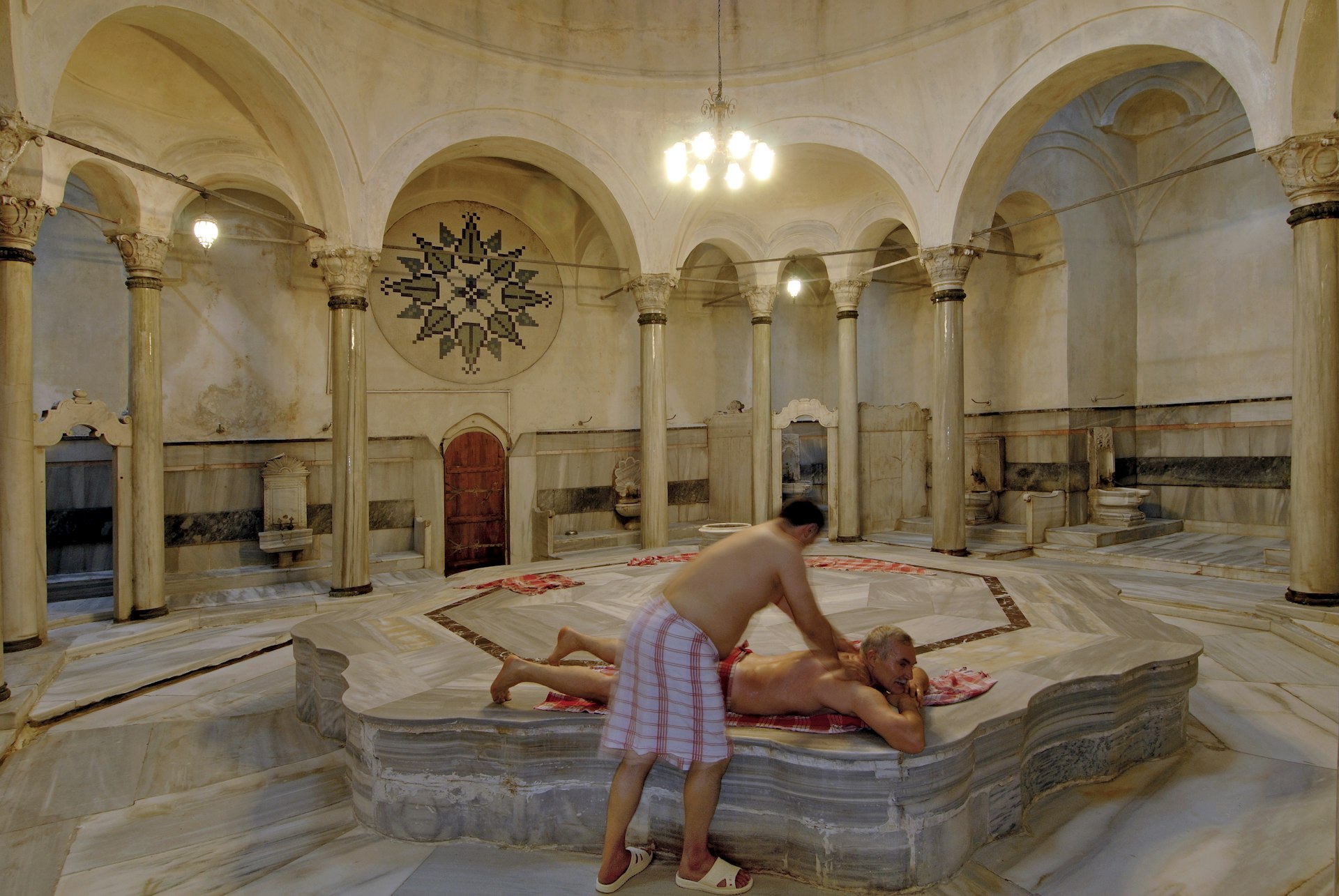 A customer getting a massage at the Hammam (Turkish baths), Istanbul