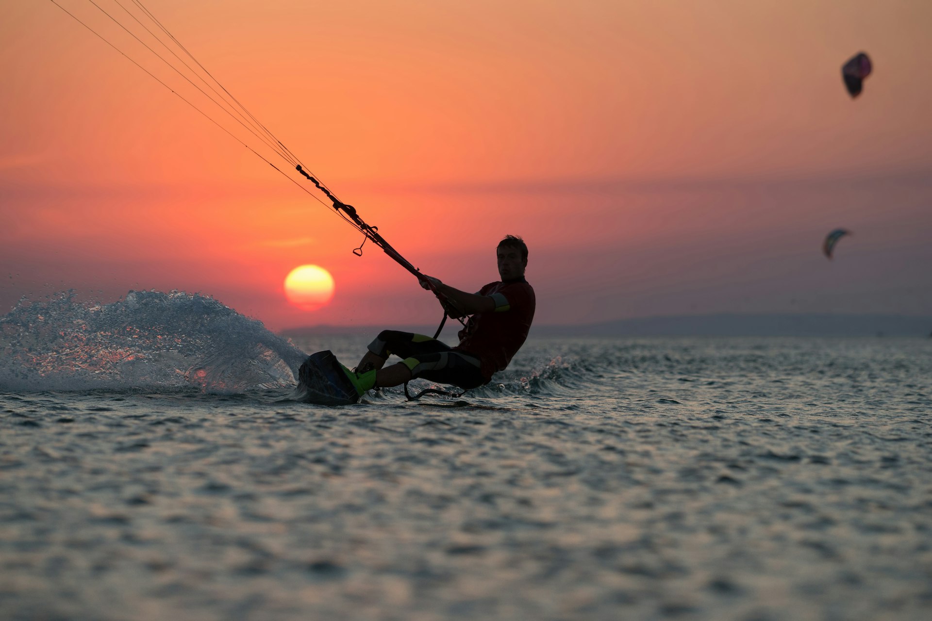 Kiteboarder at sunset off Mauritius