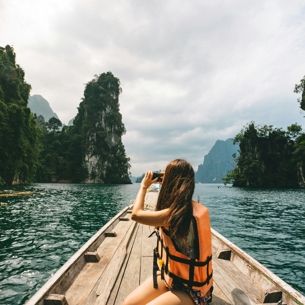 Exploring by longtail boat - Cheow Lan lake in Khao Sok National park, Thailand