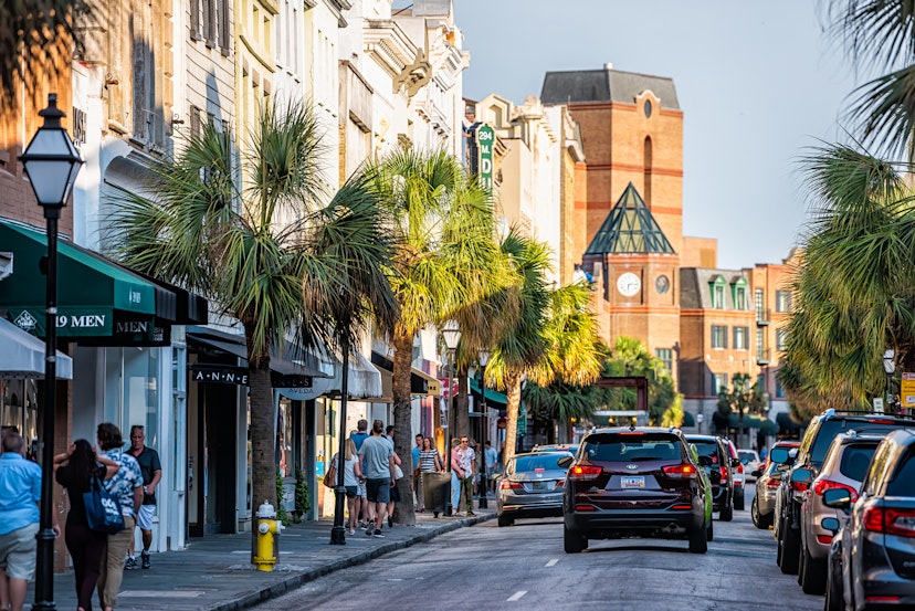 Charleston, USA - May 12, 2018: Downtown district in city with King street in South Carolina with cars and people in southern town shopping and view of Belmond Place hotel