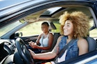 Two black women enjoying a road trip together