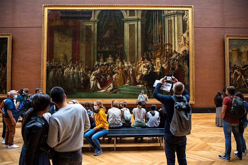 People visit the Louvre Museum