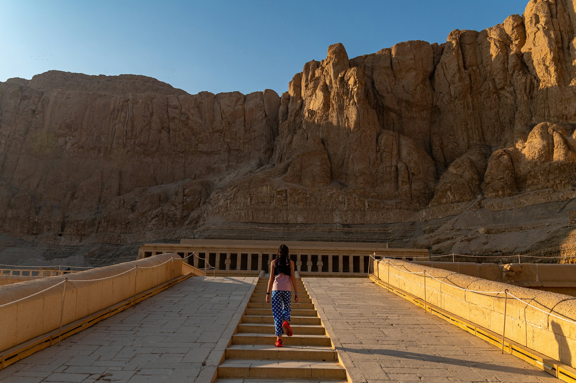Girl walking to Hatshepsut temple, Egypt