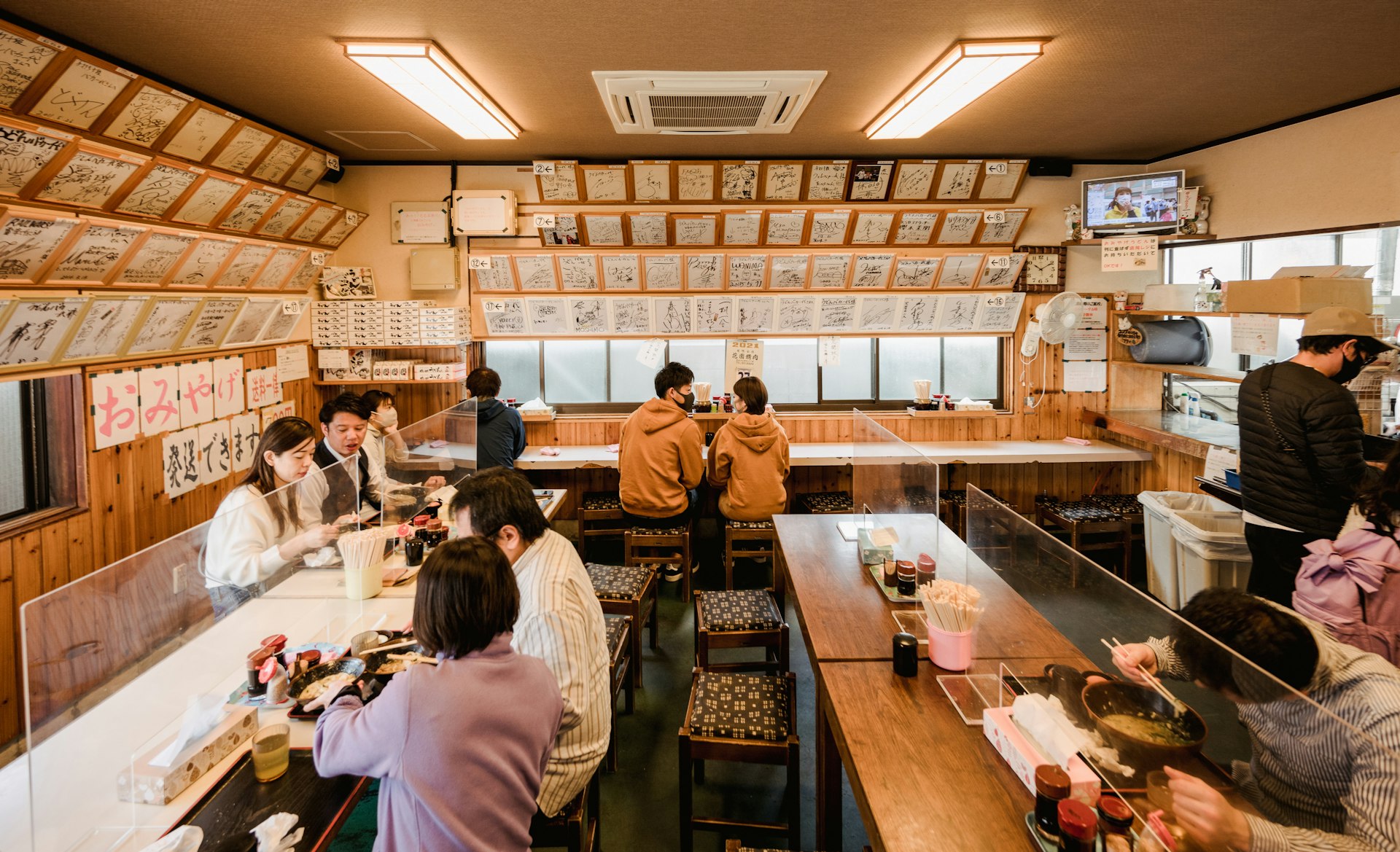 Celebrity signatures line the walls of Udon Baka Ichidai