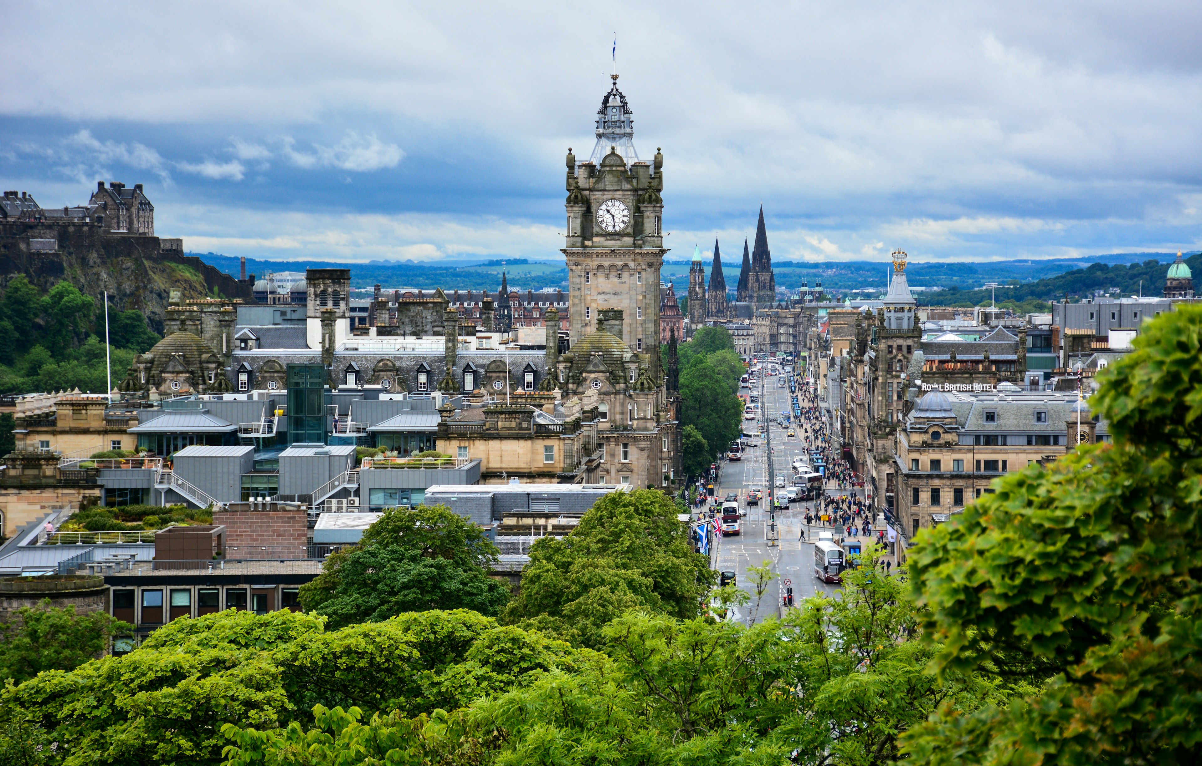 People and traffic on Princess street near Edinburgh Castle, as seen from the Calton Hill