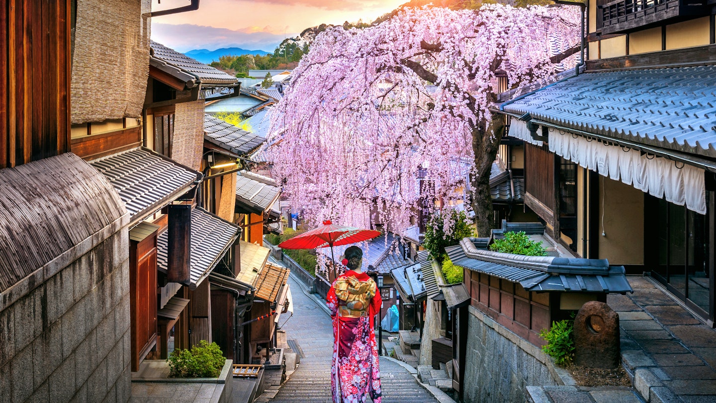 Woman wearing a traditional Japanese kimono in the Historic Higashiyama district during spring.