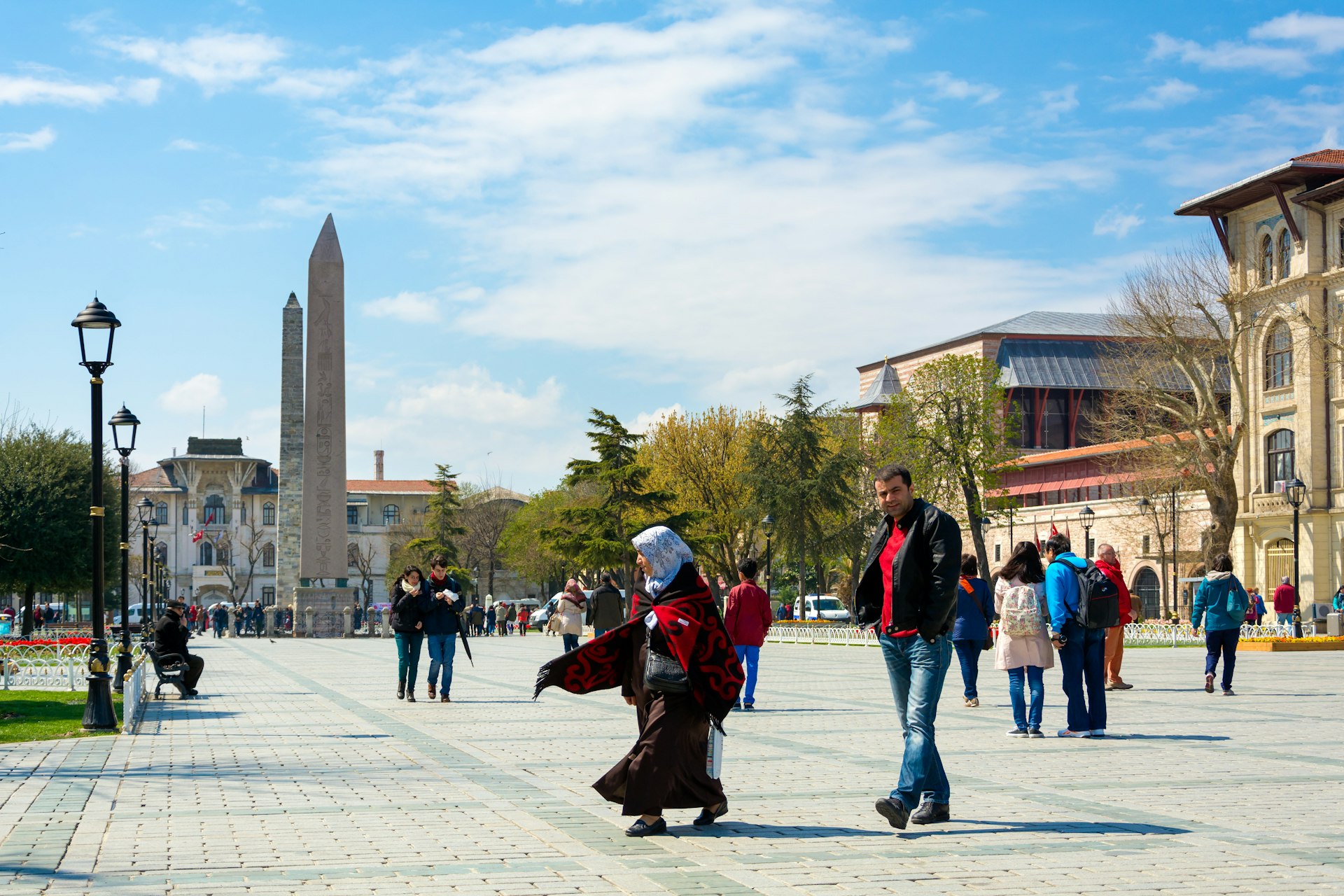 People walking in Sultan Ahmet Square near the Obelisk of Theodosius