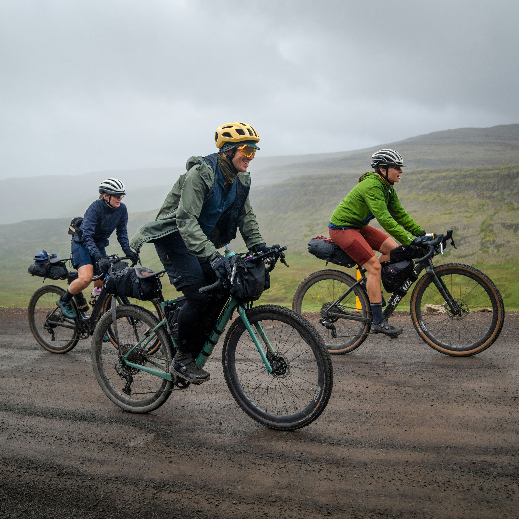 The group rides through a rainy stretch.