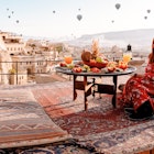 The landscape of  Cappadocia and its horizon filled with hot air balloons is one of the most iconic sights in Turkey