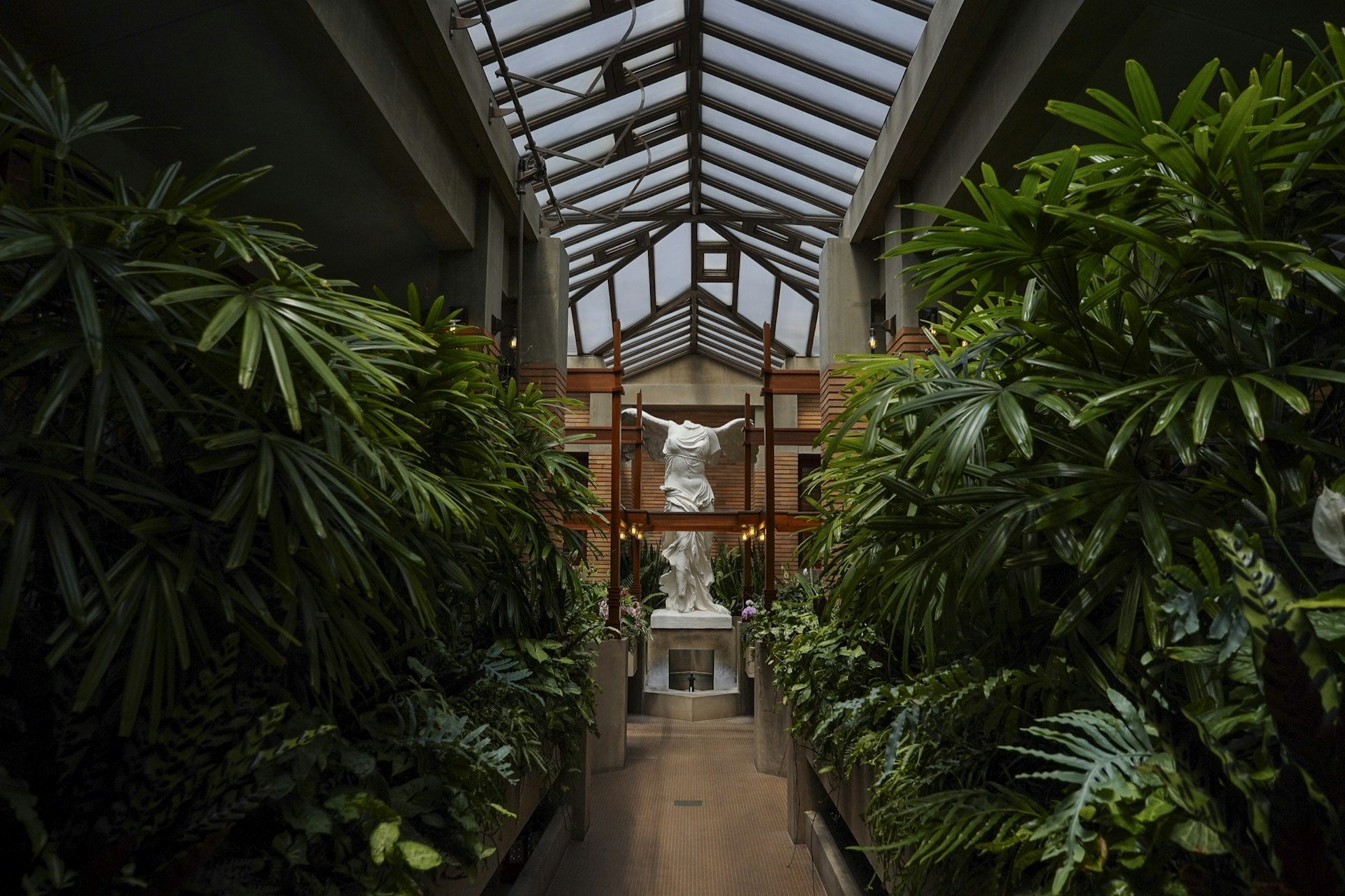 A statue of Nike of Samothrace presides over the conservatory at the Martin House, designed by Frank Lloyd Wright, in Buffalo