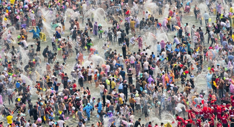 The annual Water Splashing Festival of the Dai ethnic minority falls during the New Year celebrations of the Dai Calendar. It is the most important festival observed by the Dai ethnic people of Xishuangbanna Prefecture. It involves three days of celebrations that include sincere, yet light-hearted religious rituals that invariably end in merrymaking, where everyone ends up getting splashed, sprayed or doused with water.