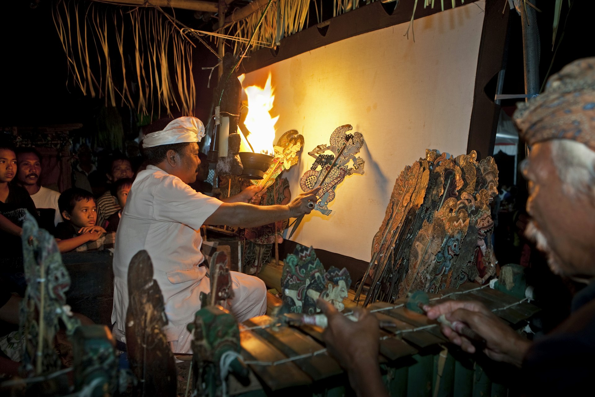 Behind the screen at a Wayang Kulit shadow puppet theater, Bali
