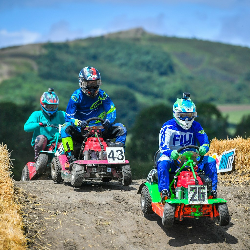 Lawn mower racing
Competitors battle it out during the Red Bull Cut It, lawn mower racing event, where participants reach speeds of up to 50mph on modified ride-on lawnmowers as they navigate their way around four separate courses at Chestnut House, in Lower Weare, Axbridge. (Photo by Ben Birchall/PA Images via Getty Images)