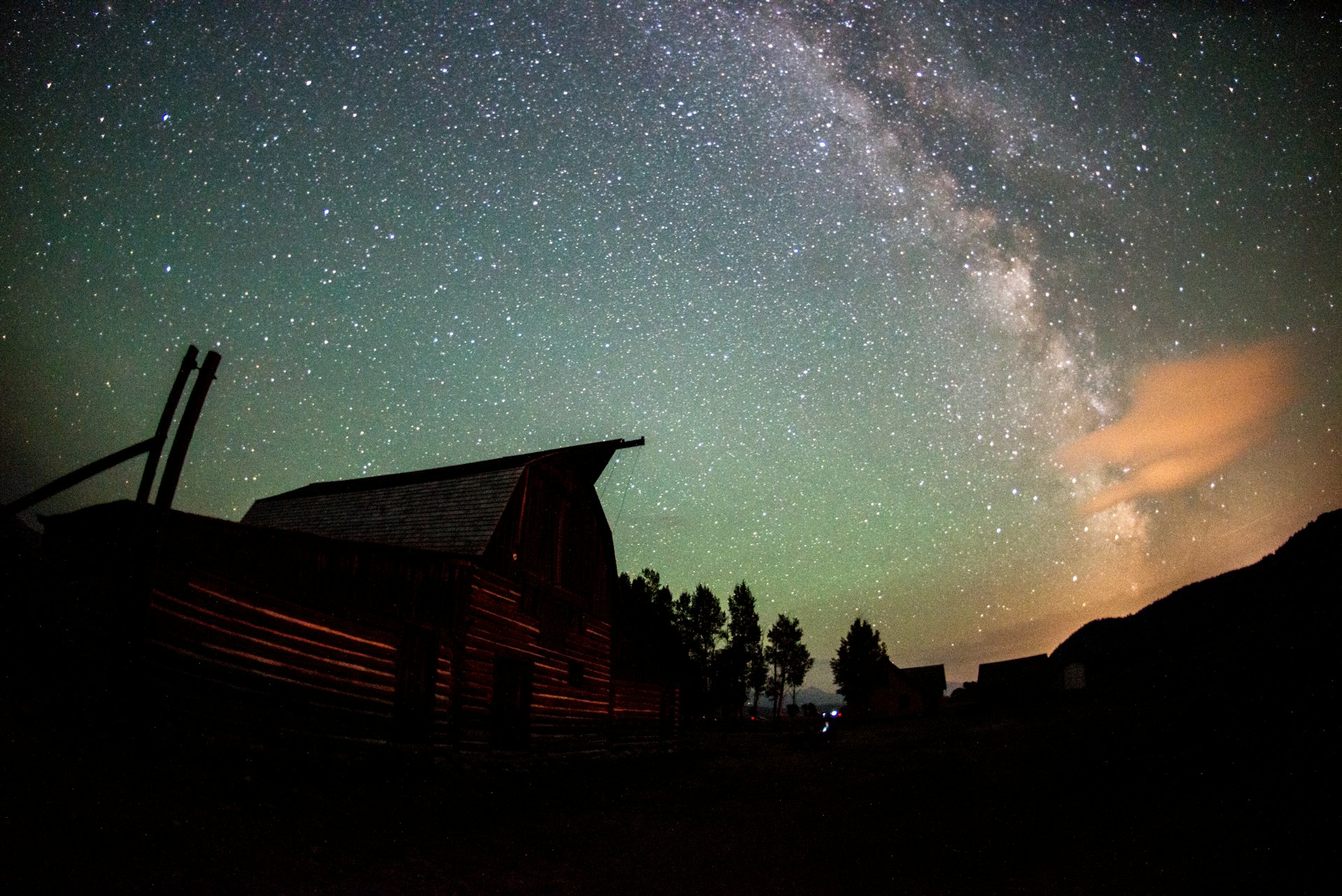 Celestial skies filled with stars seen over T.A Moulton Barn, Grand Tetons National Park