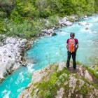 Senior man hiking by the Soca River, Triglav National Park