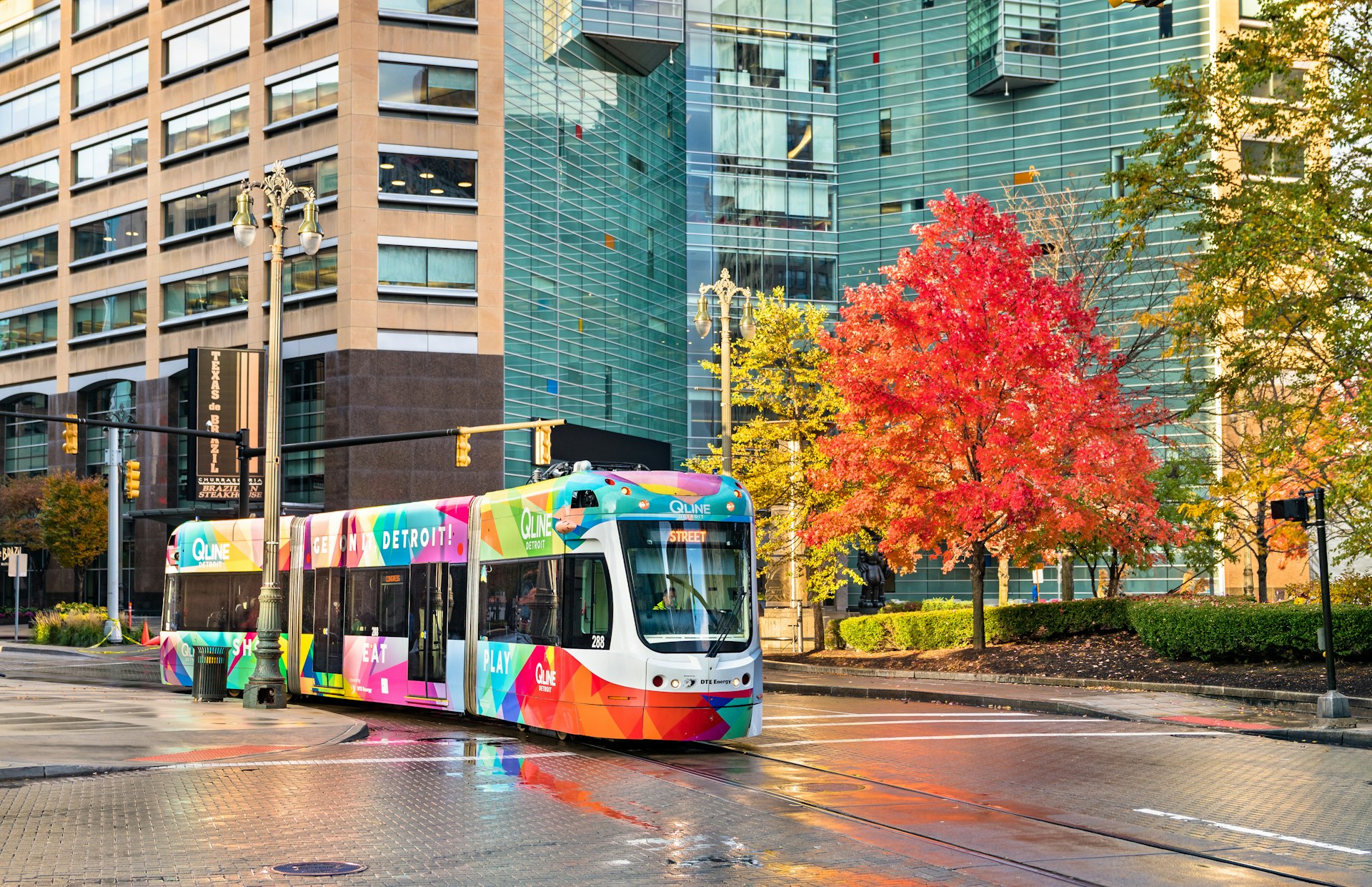 QLine streetcar running through downtown Detroit