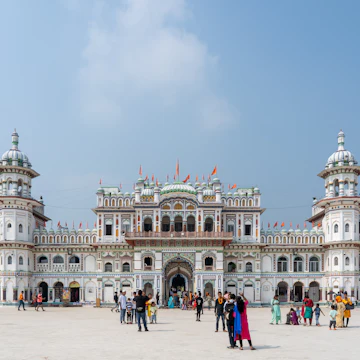 Pilgrims walking on the plaza of the Janaki Mandir in Janakpur, Nepal.