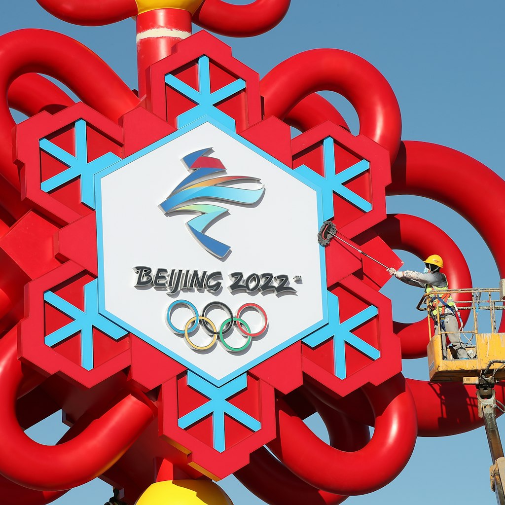 Big Winter Olympics-themed Chinese Knot Installed At Tian'anmen Square
BEIJING, CHINA - JANUARY 13: A worker clears the Winter Olympics-themed Chinese knot installation at Tian'anmen Square on January 13, 2022 in Beijing, China. (Photo by Wang Xin/VCG via Getty Images)