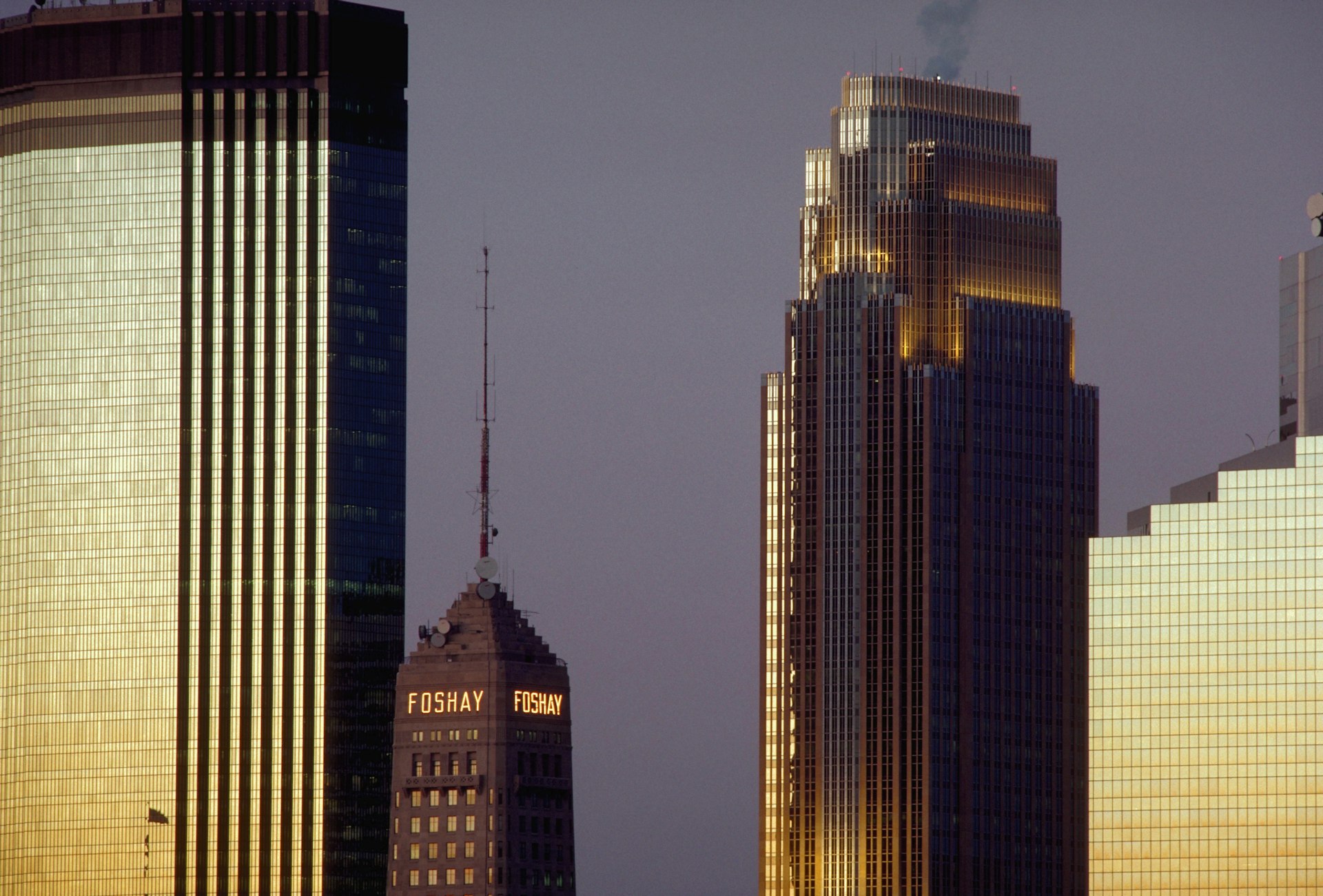 The Foshay Tower flanked by taller modern office towers