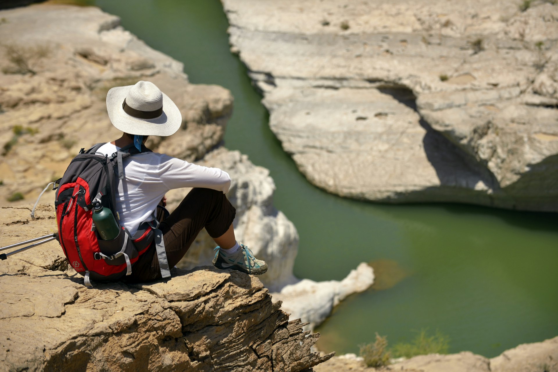 A woman looking over a rocky landscape in Oman