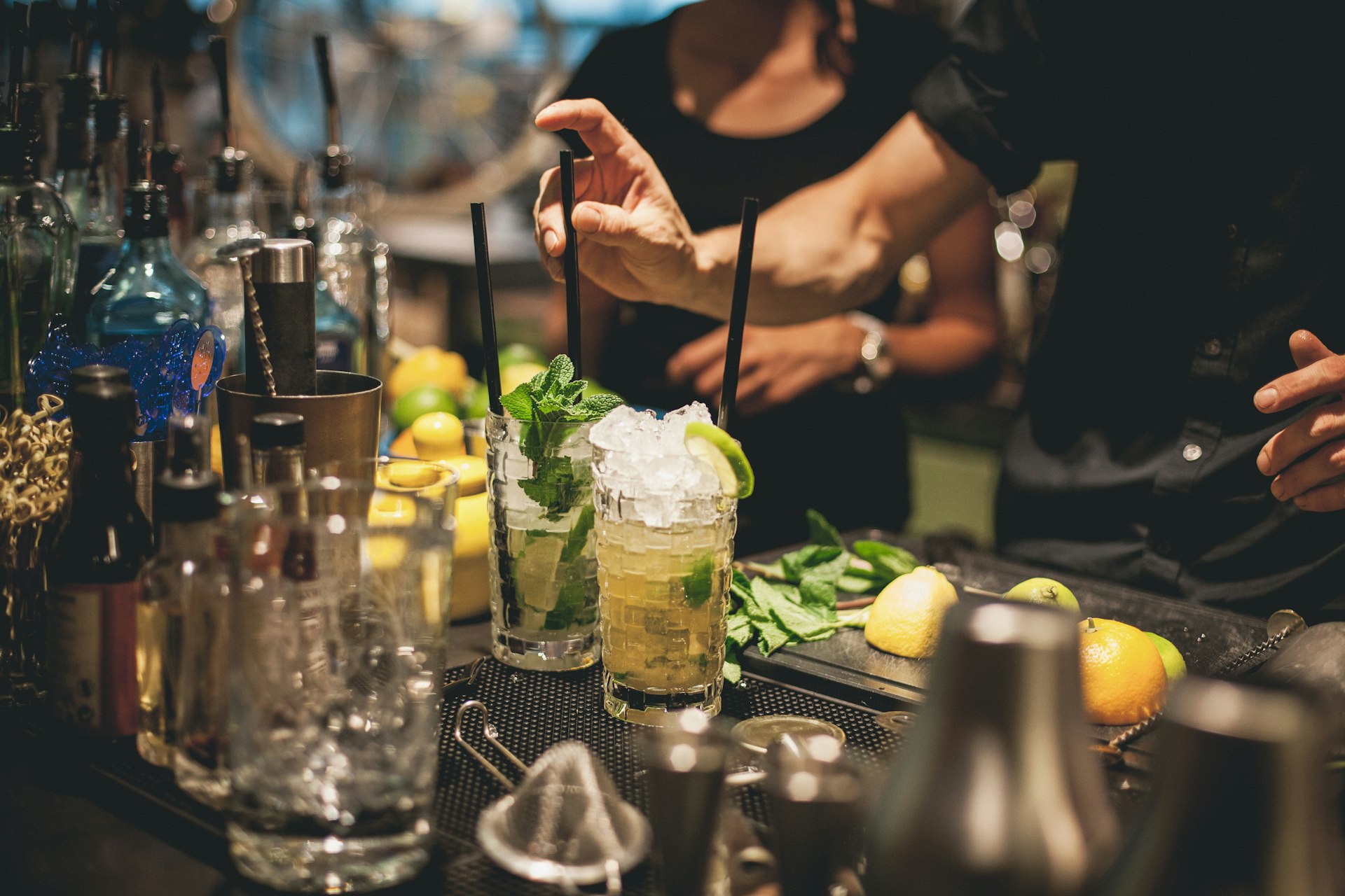 Bartender preparing mojito cocktails in Berlin