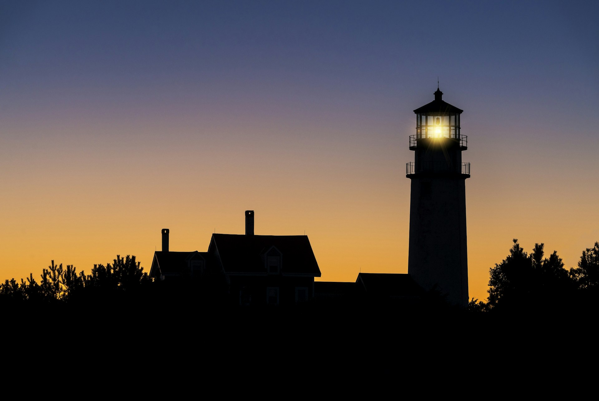 Silhouette of the Highland Lighthouse at dawn