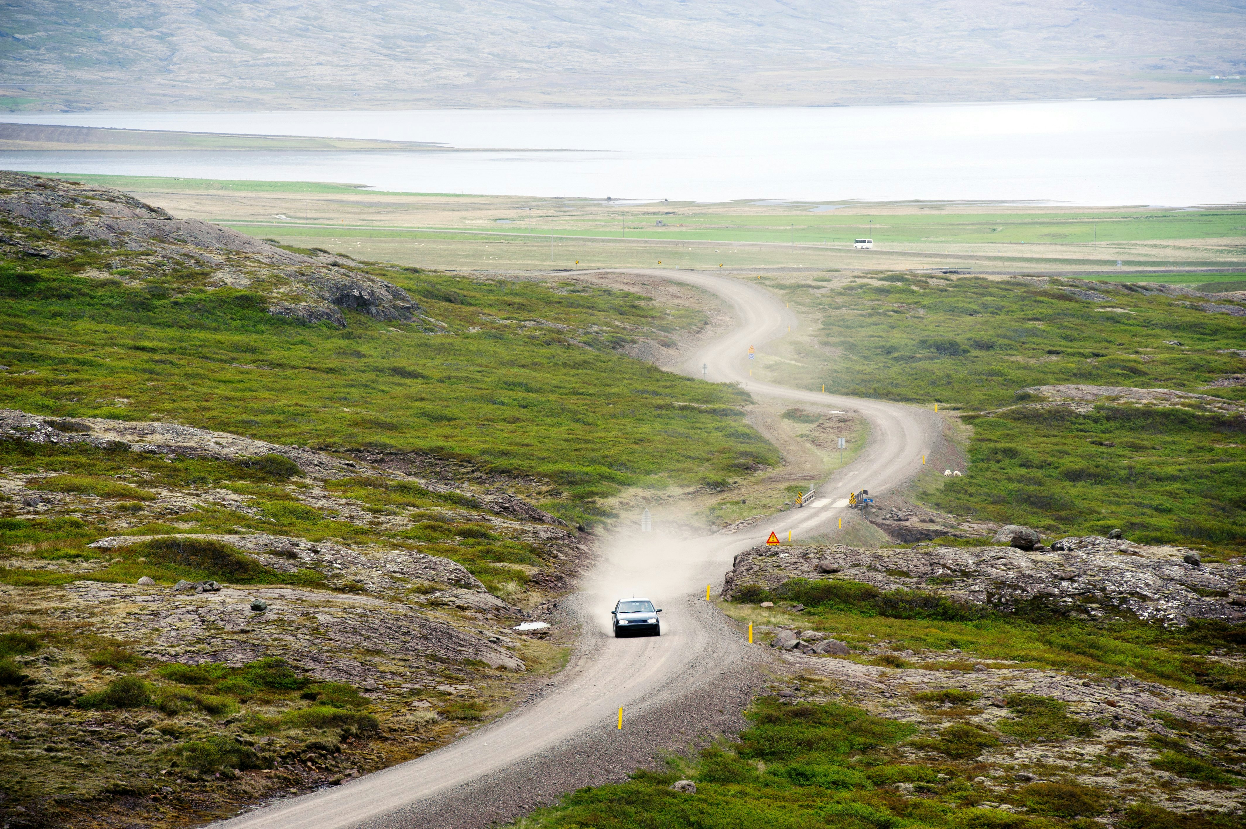 A car on the Öxi mountain pass, Eastern of Iceland - stock photo
Öxi pass is a mountain pass in eastern region, Iceland.