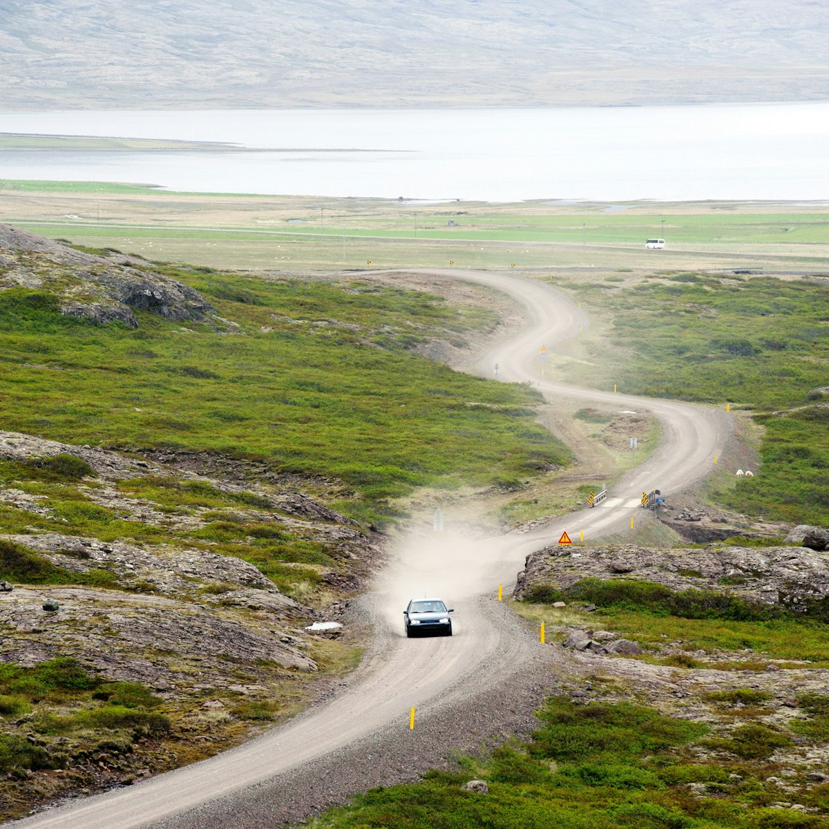 A car on the Öxi mountain pass, Eastern of Iceland - stock photo
Öxi pass is a mountain pass in eastern region, Iceland.