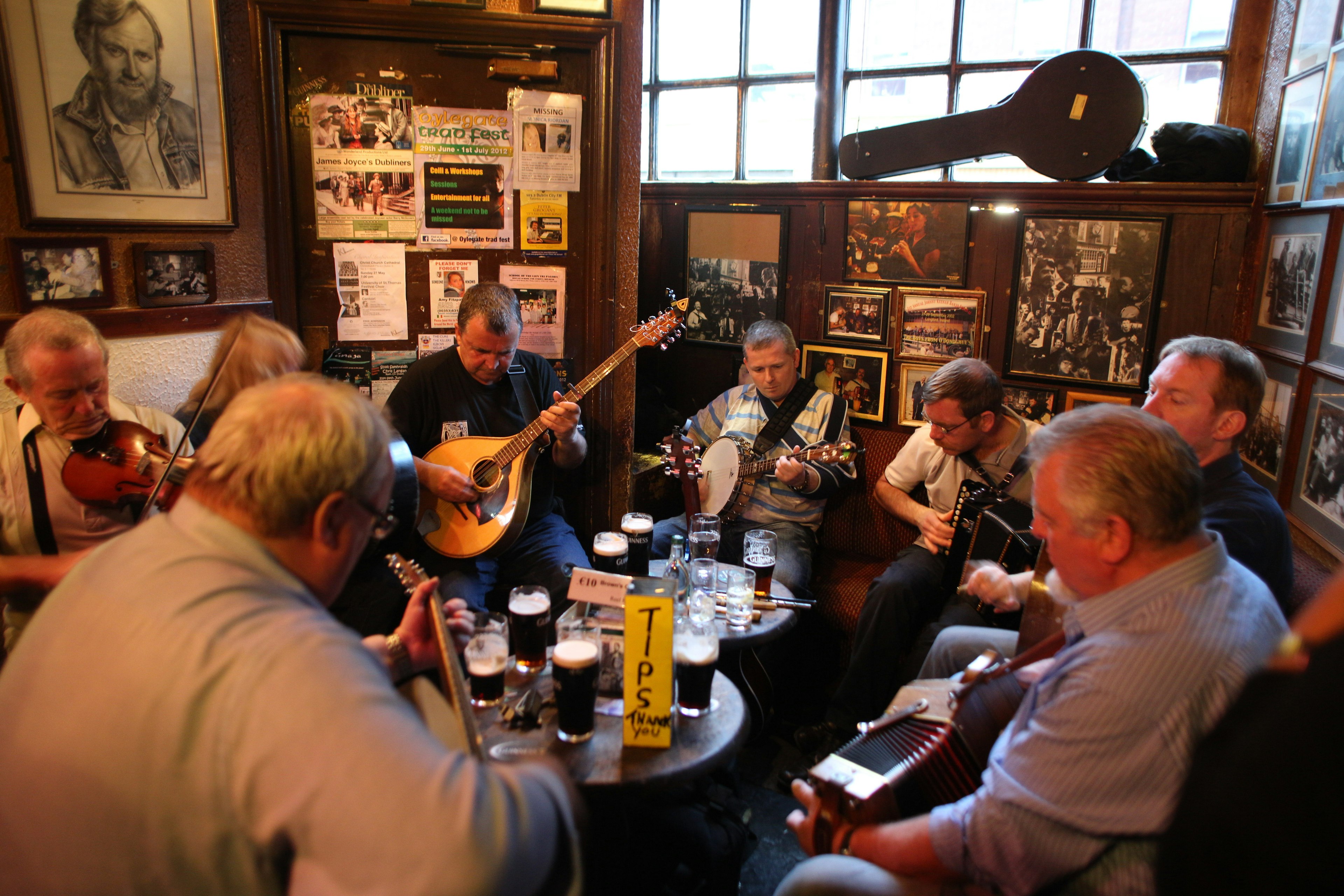 Musician's playing in O'Donoghue's Bar, Dublin, Ireland. O'Donoghue's is known for it's traditional Irish music. It has been frequented of the years by many musicians from the Dubliner's to Bruce Springsteen. O'Donoghue's is recognized as one of Dublin's most famous pubs and is frequented by locals and tourist alike to play a tune or enjoy a pint of Guinness. Dublin, Ireland. Photo Tim Clayton (Photo by Tim Clayton/Corbis via Getty Images)