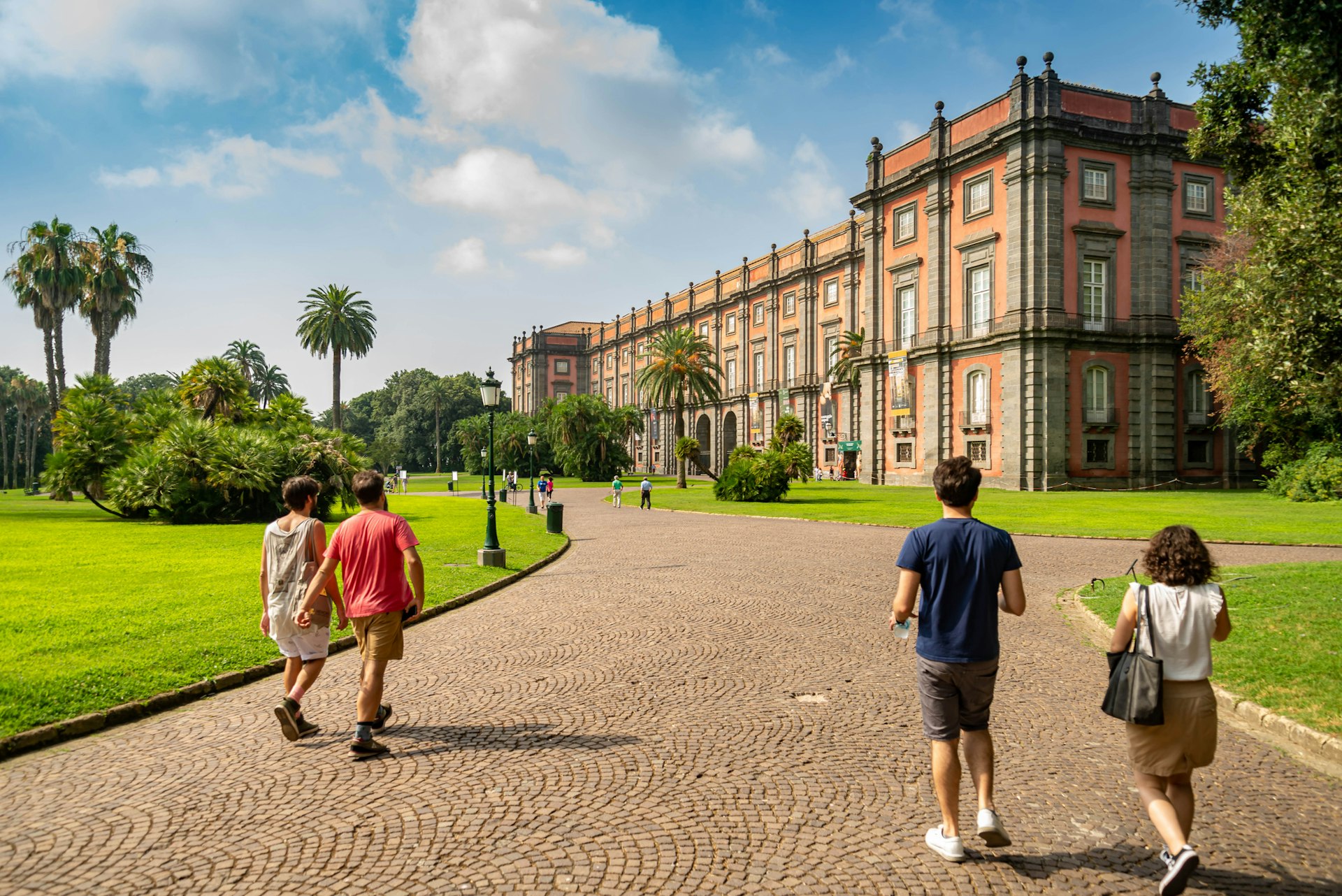 People walk through the park towards the Palazzo Real di Capodimonte, one of the most important Italian museums