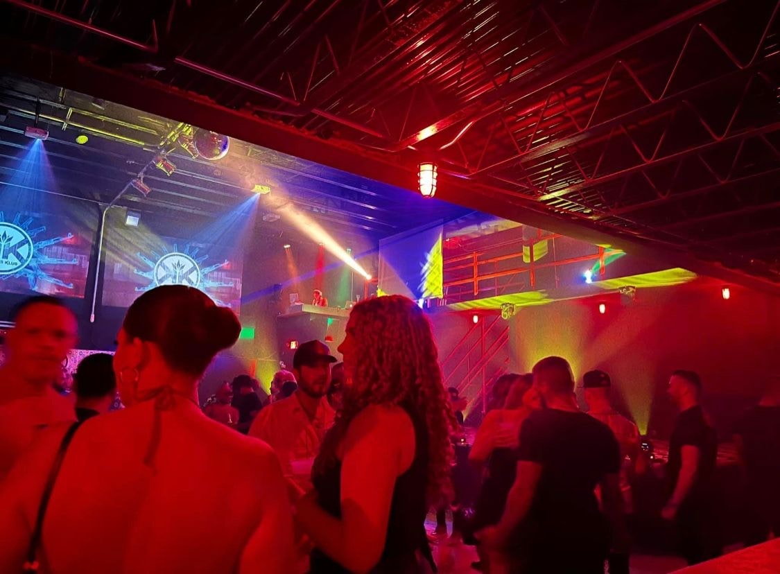 A group of people hanging out at Kween's Klub nightclub in San Juan, Puerto Rico   