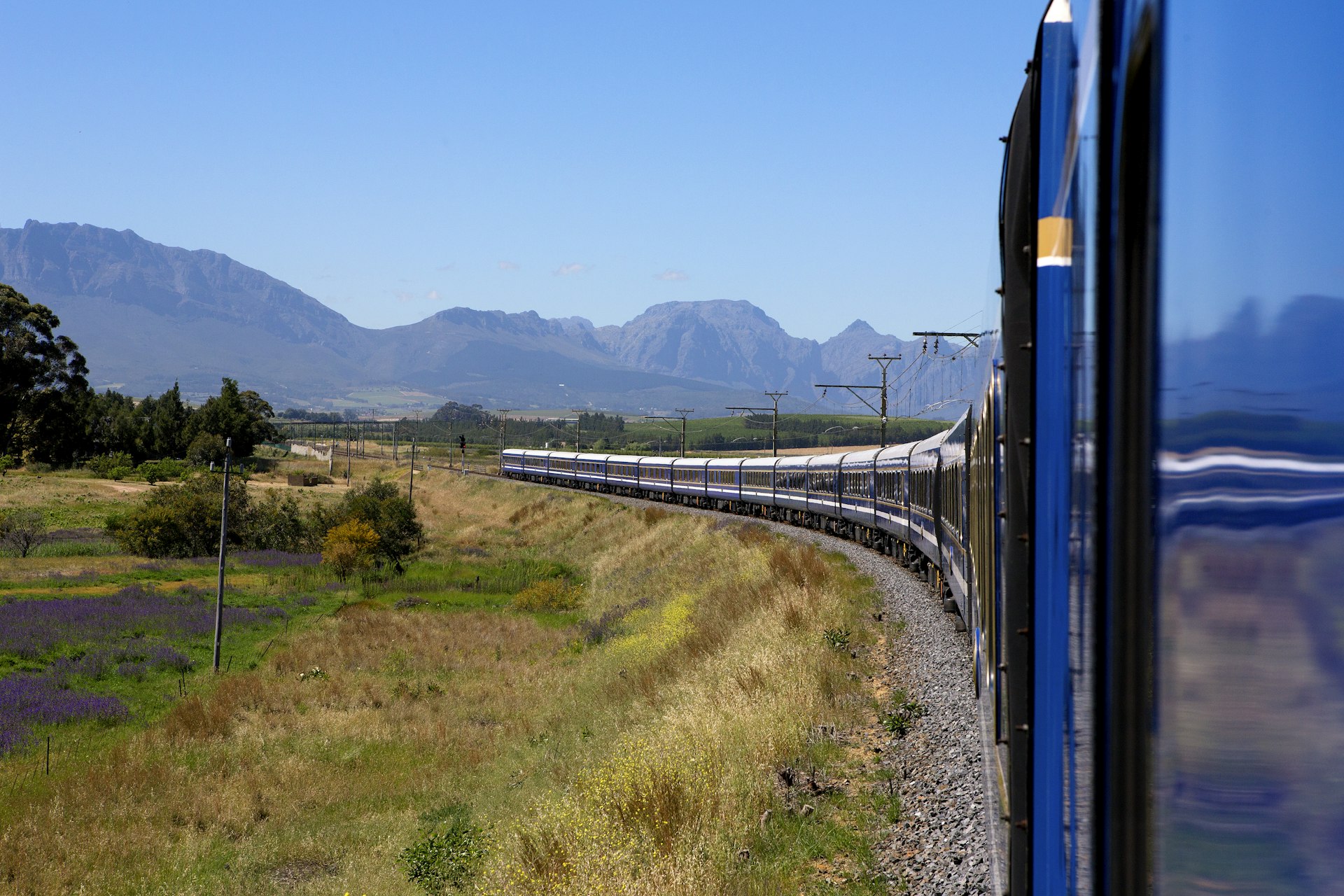 The Blue Train passing peaks of Simonsberg on the route from Cape Town to Pretoria, South Africa