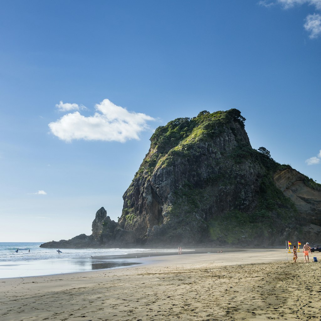 Lion Rock dominates the bay and beach at Piha.